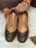 Leather base jutti with metal work