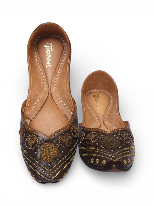 Leather base jutti with metal work