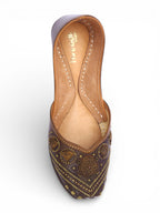 Leather base jutti with metal work