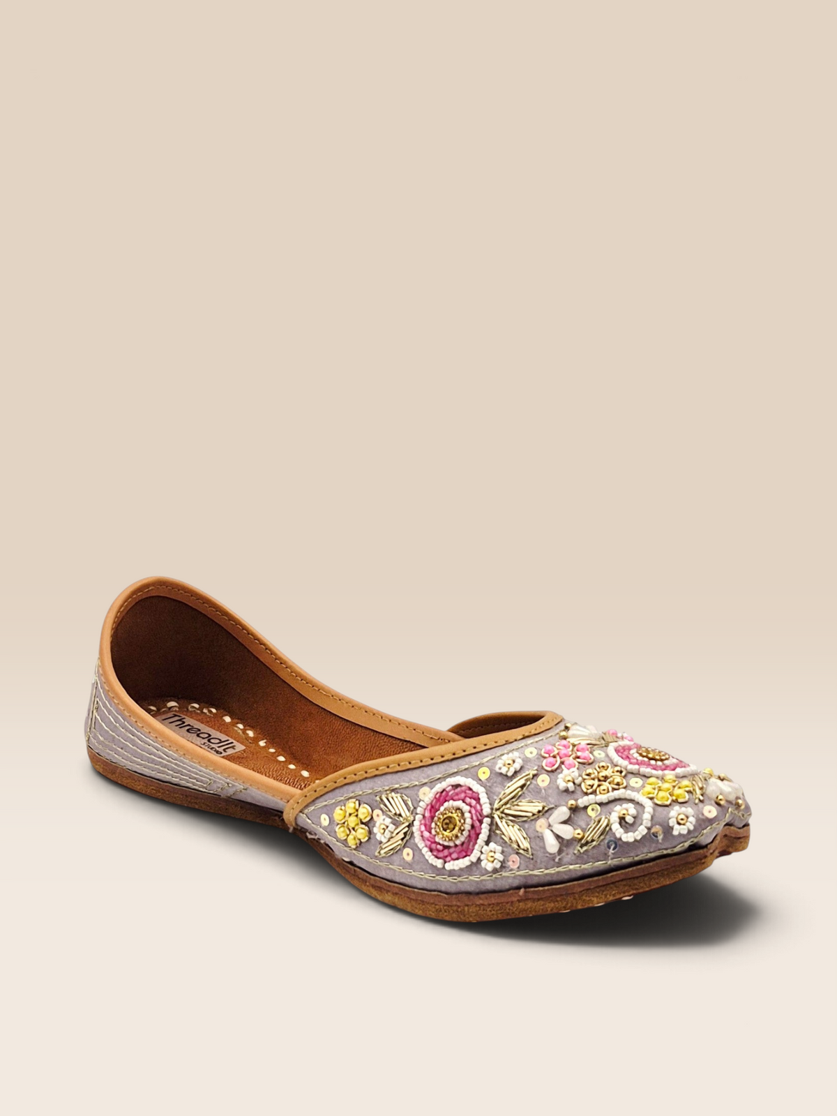 ThreadItStudio lavender handcrafted Punjabi jutti with intricate floral embroidery, beads, and sequins.