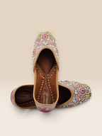 ThreadItStudio handcrafted lavender Punjabi jutti with intricate floral embroidery and traditional beadwork details.