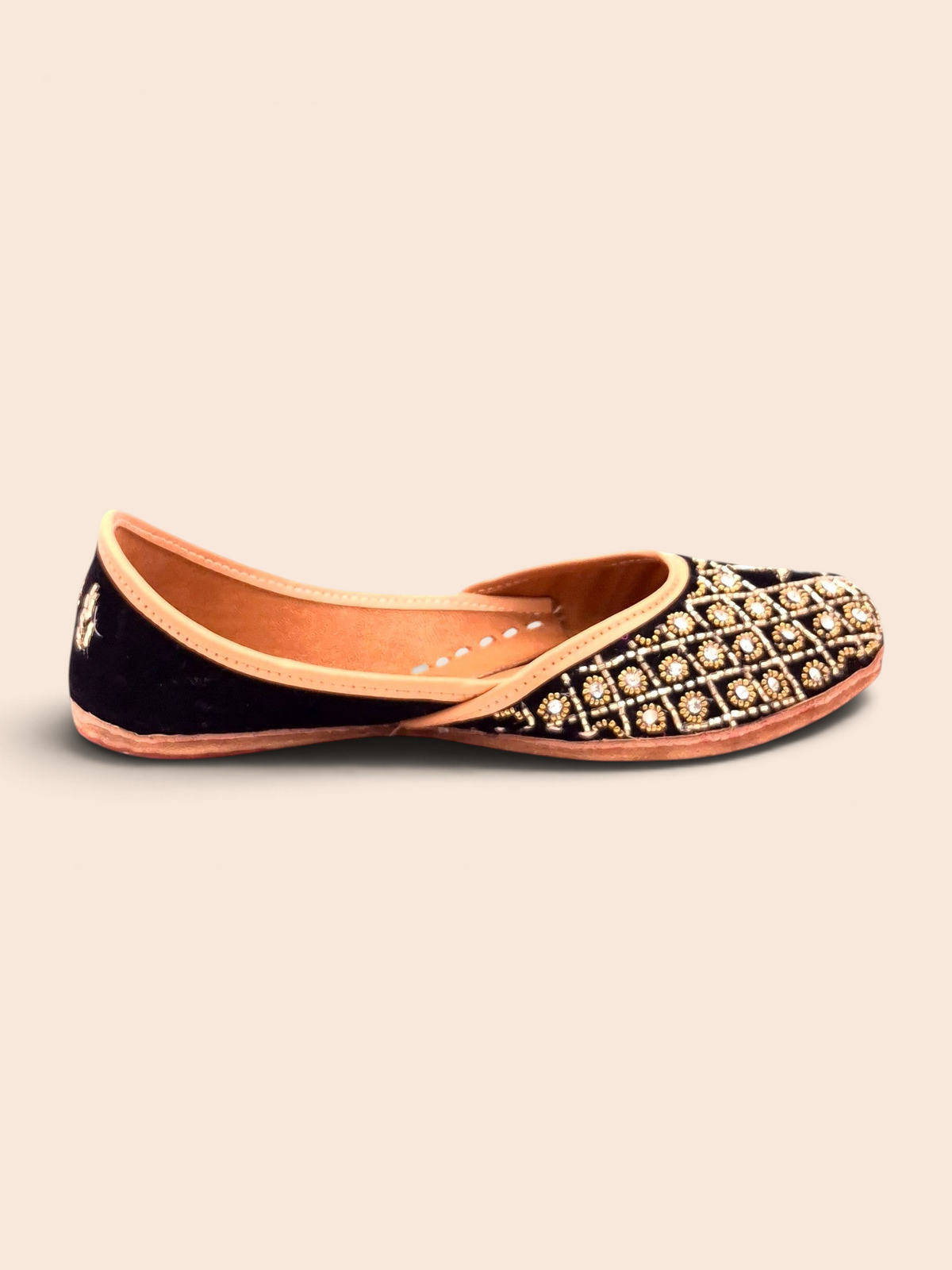ThreadItStudio handcrafted midnight blue jutti with intricate gold beadwork and festive embroidery