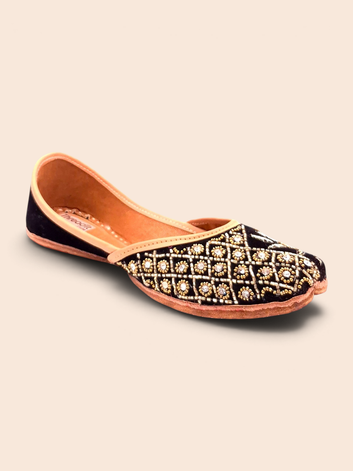 ThreadItStudio handcrafted midnight blue jutti with intricate gold beadwork and crystal embellishments