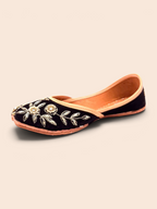 ThreadItStudio handcrafted midnight black jutti with intricate gold floral embroidery for festive occasions