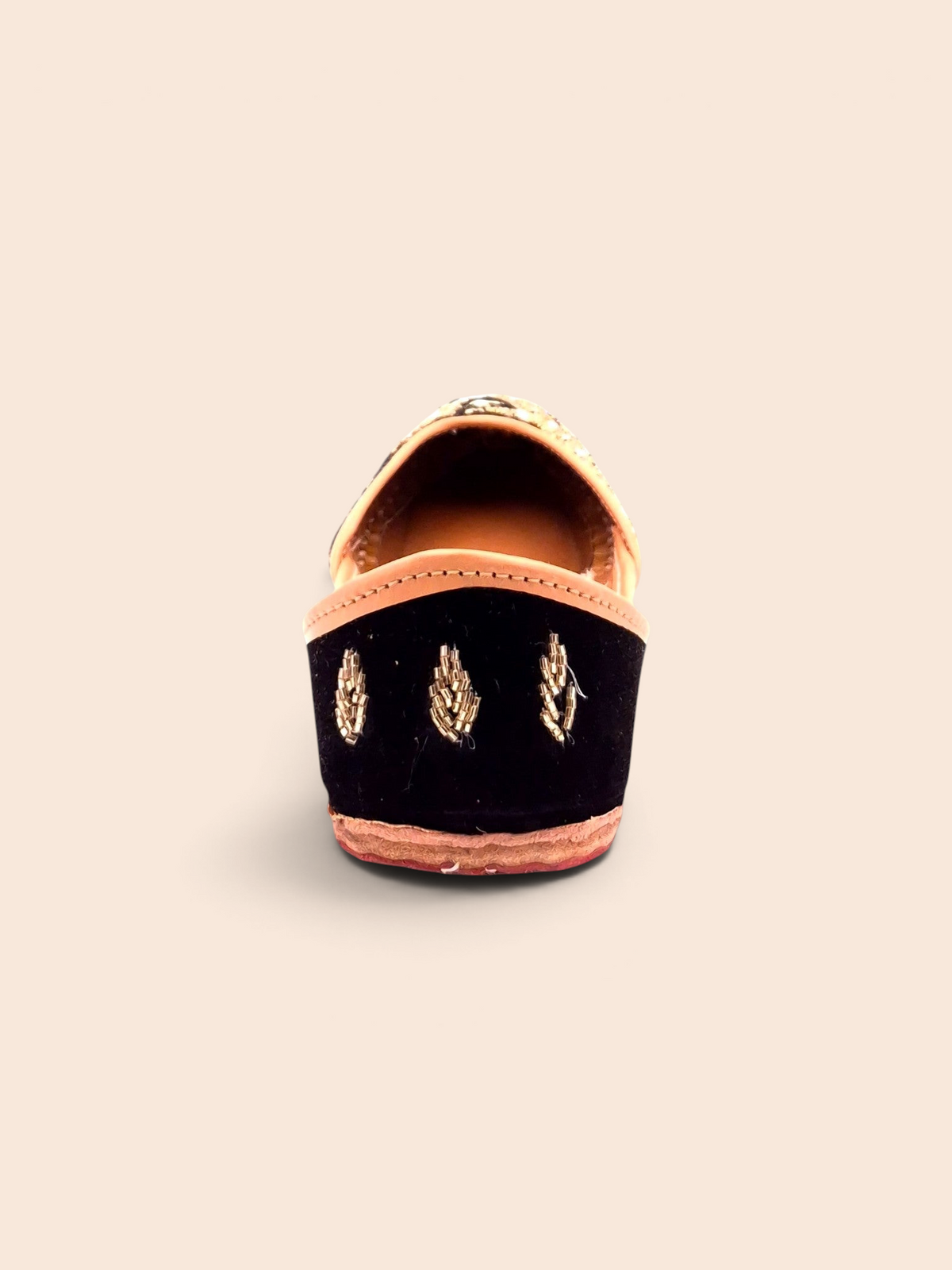 ThreadItStudio handcrafted midnight black jutti with gold bead embellishments on the heel for festive wear