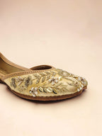 ThreadItStudio handcrafted golden jutti with intricate metallic embroidery and beadwork for festive occasions