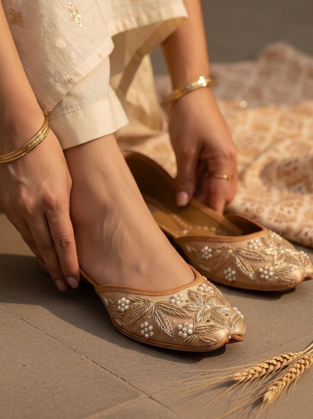 ThreadItStudio handcrafted Shahi Jutti in gold with intricate vintage gilt embroidery and pearl accents