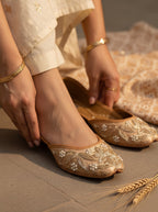 ThreadItStudio handcrafted Shahi Jutti in gold with intricate vintage gilt embroidery and pearl accents