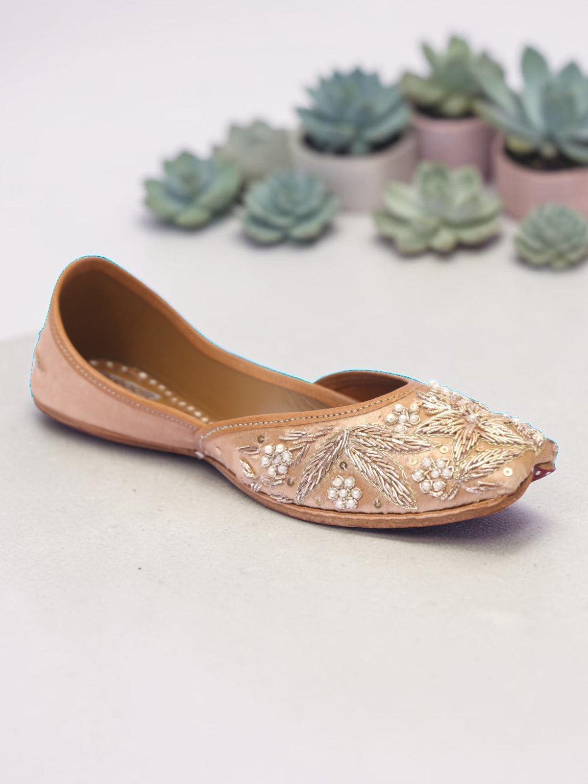 ThreadItStudio handcrafted Shahi jutti in beige with intricate vintage gilt embroidery and pearl detailing.