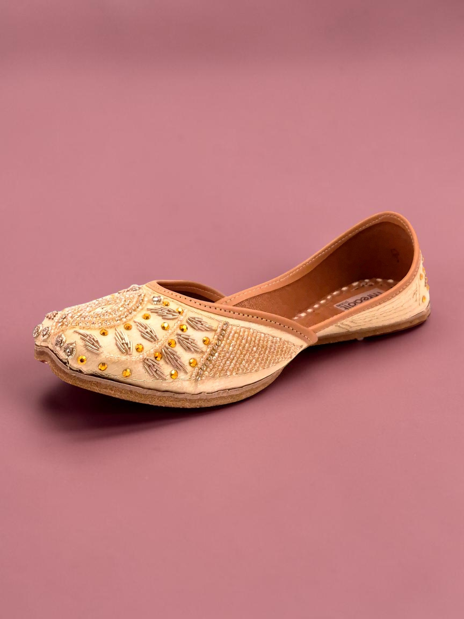 ThreadItStudio Honey Glow Steps handcrafted juttis in cream with intricate gold embroidery and beadwork
