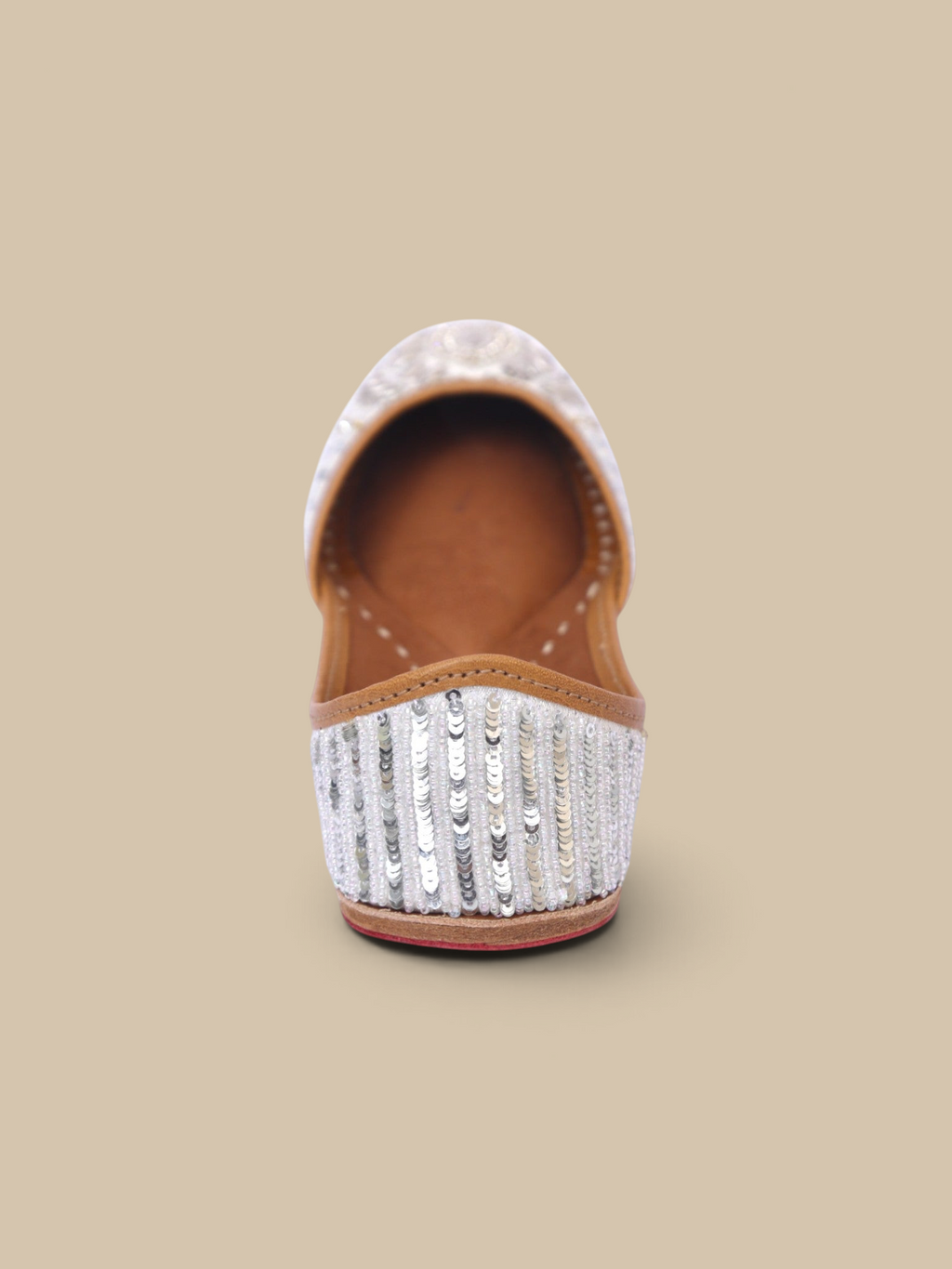ThreadItStudio Ivory Virasat handcrafted juttis featuring intricate silver sequin embroidery and floral detailing.
