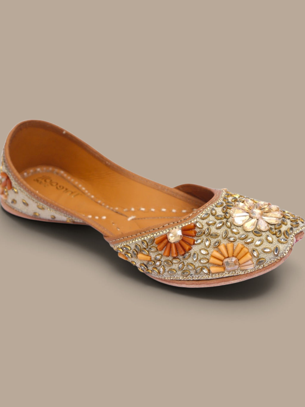 ThreadItStudio handcrafted ethnic jutti featuring intricate gold kundan beadwork and floral embellishments