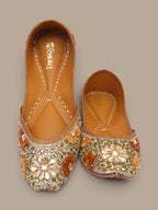 ThreadItStudio handcrafted ethnic jutti featuring intricate gold kundan beadwork and floral embellishments
