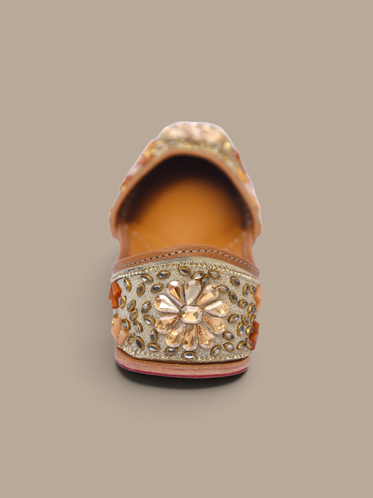 ThreadItStudio handcrafted ethnic jutti featuring intricate gold kundan beadwork and floral embellishments