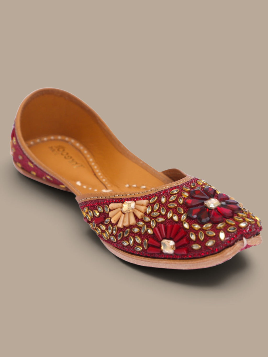 ThreadItStudio handcrafted maroon ethnic jutti with intricate kundan beadwork and floral embellishments for weddings.