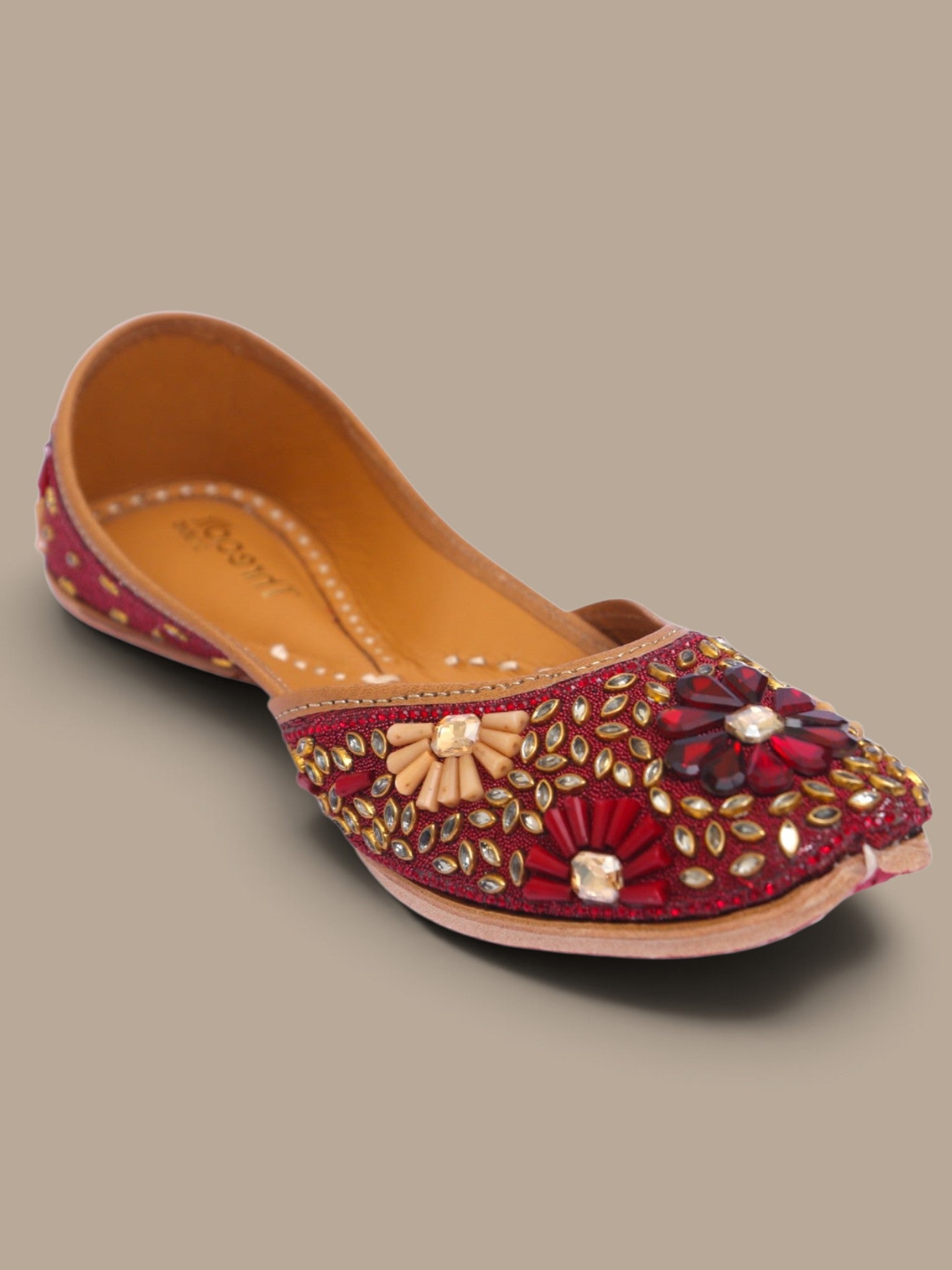 ThreadItStudio handcrafted maroon ethnic jutti with intricate kundan beadwork and floral embellishments for weddings.
