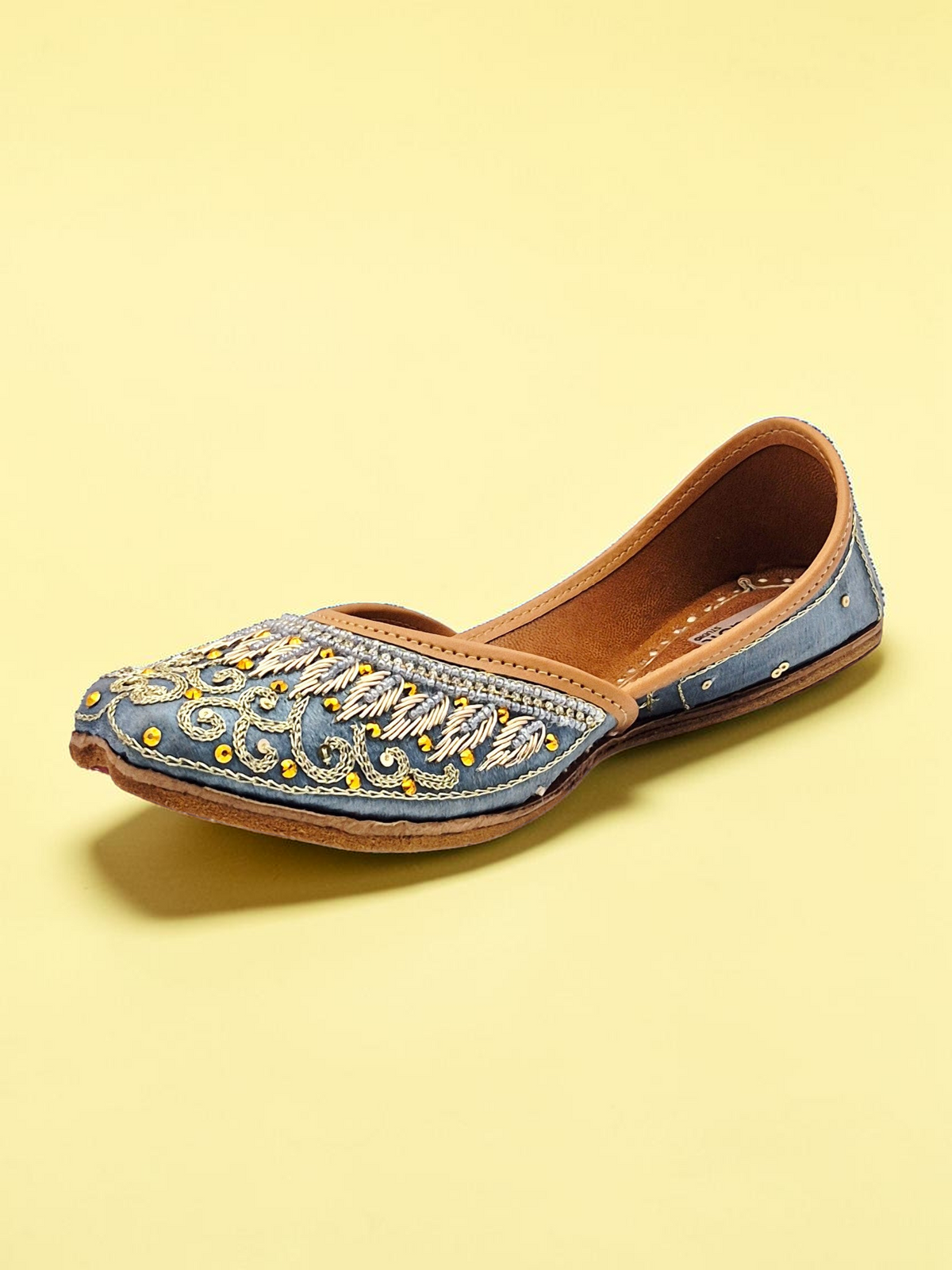 ThreadItStudio midnight blue handcrafted jutti with intricate gold eagle embroidery and traditional beadwork