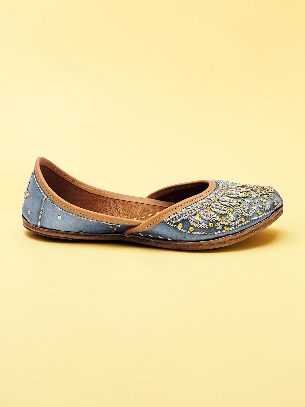ThreadItStudio midnight blue handcrafted jutti with intricate eagle embroidery and gold bead detailing
