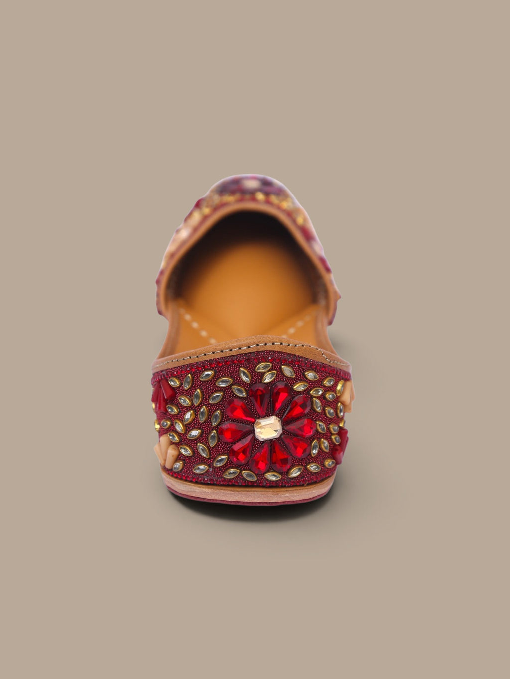 ThreadItStudio handcrafted ethnic jutti featuring intricate red kundan beadwork and floral patterns for festive wear